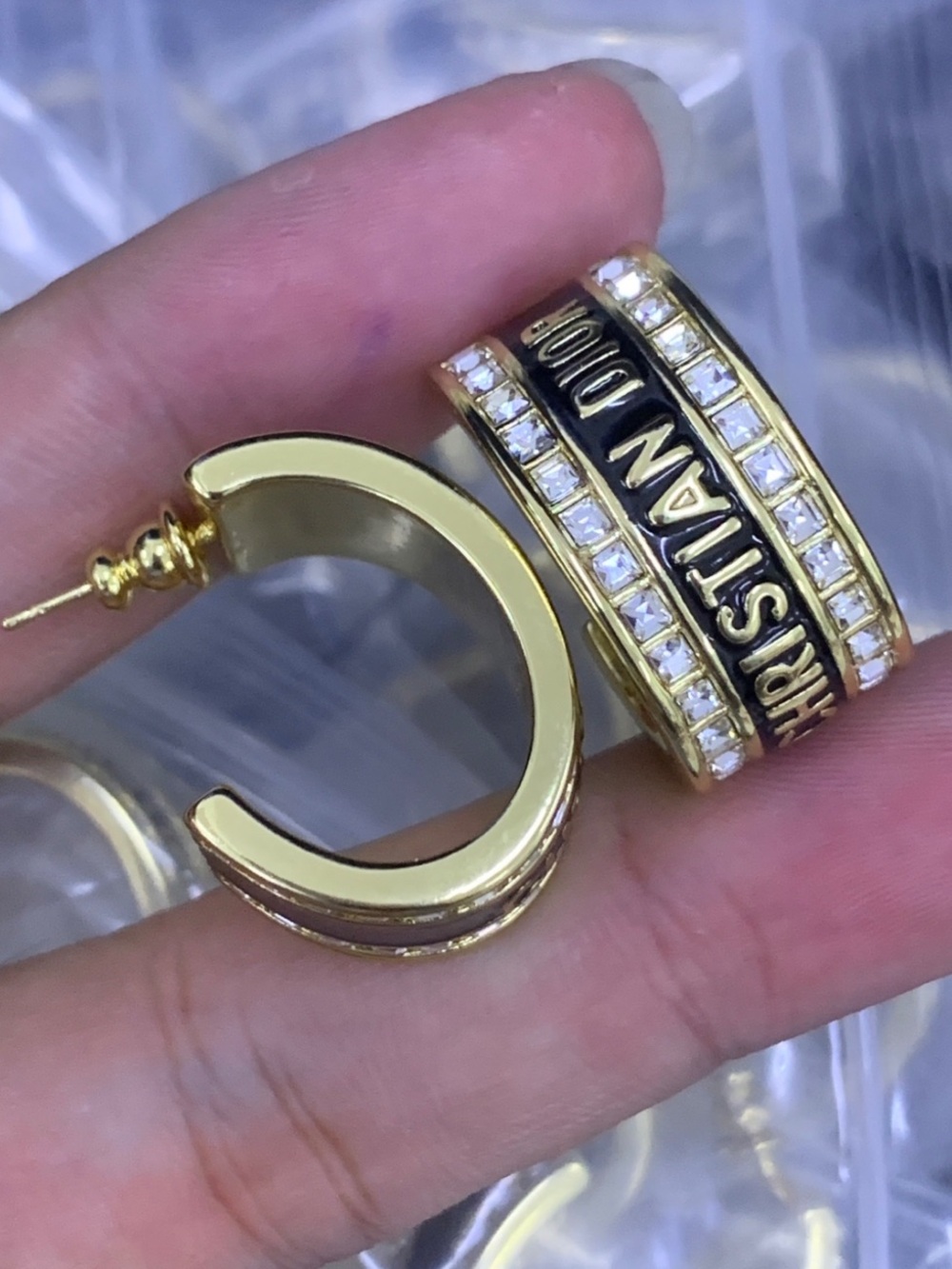 Gold-Tone Hoop Earrings with Black Logo Band and Crystal Accents